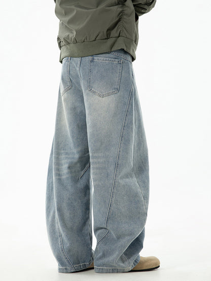 Calça jeans baggy de denim lavado e desgastado
