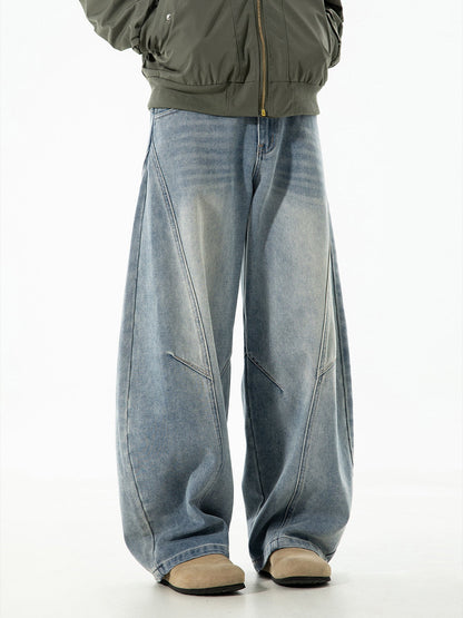 Calça jeans baggy de denim lavado e desgastado