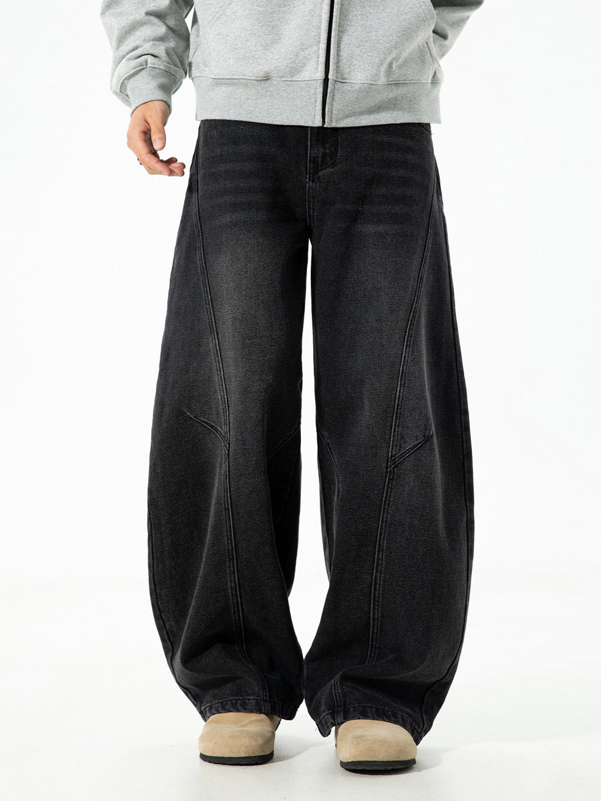 Calça jeans baggy de denim lavado e desgastado