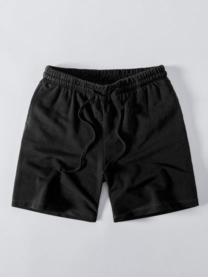 Camiseta Pesada com Ombro Caído e Efeito Lavado & Shorts com Cordão e Efeito Desgastado Lavado
