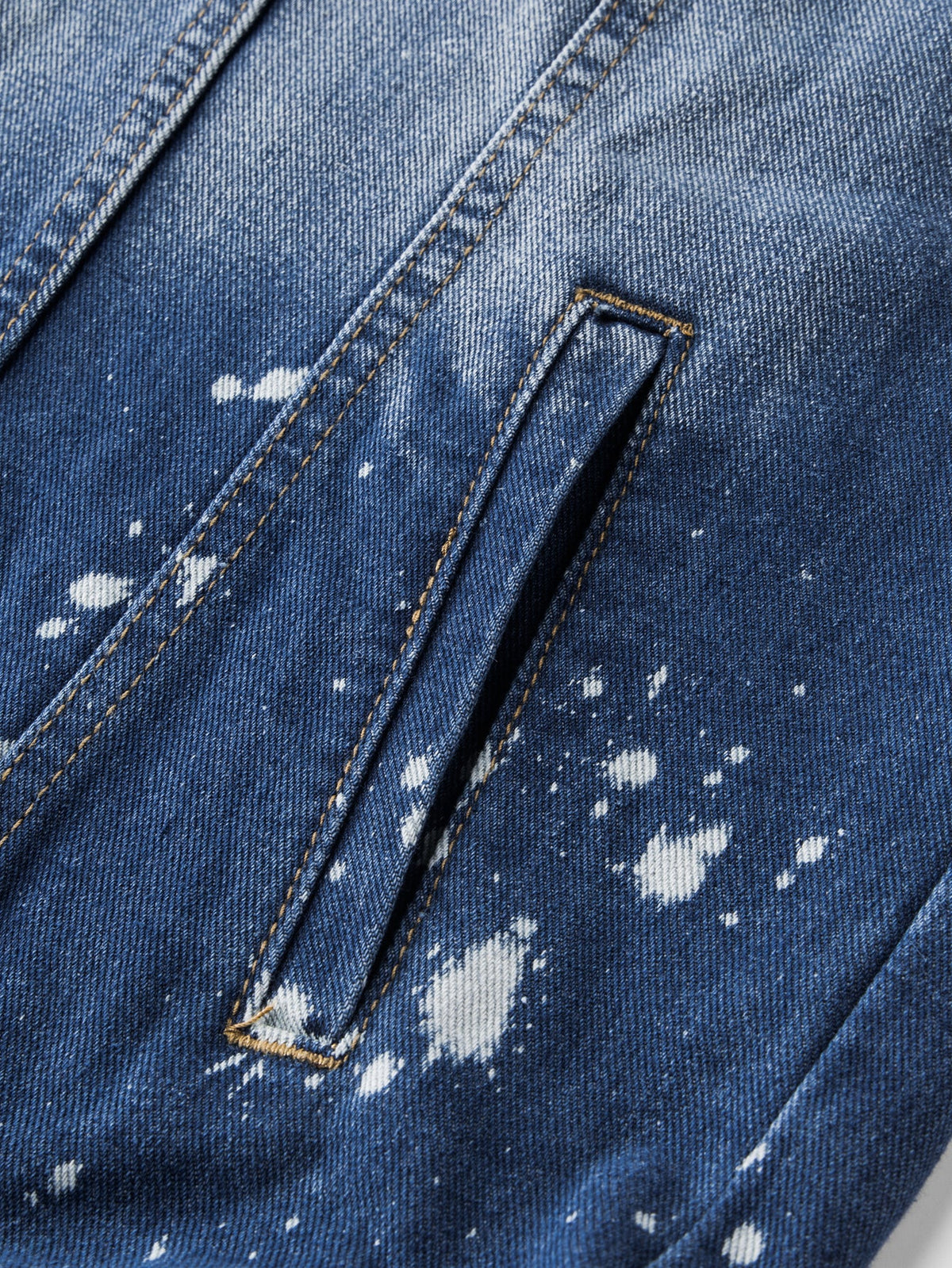 Jaqueta jeans lavada desgastada com respingos de tinta