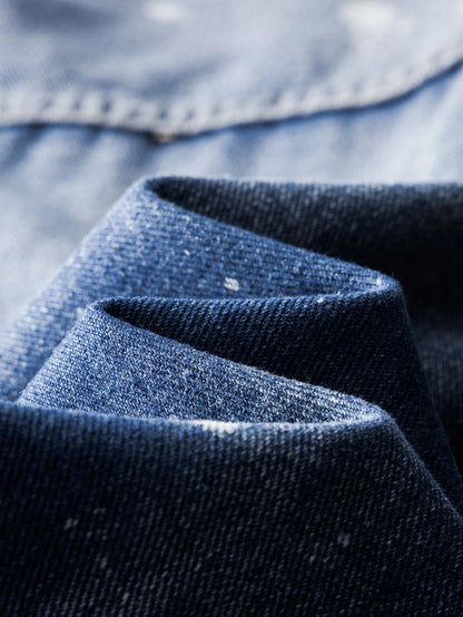Jaqueta jeans lavada desgastada com respingos de tinta