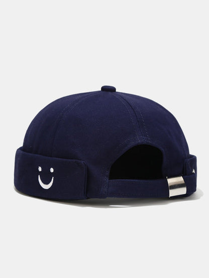 Boné ajustável de algodão sem viseira com bordado de carinha sorridente
