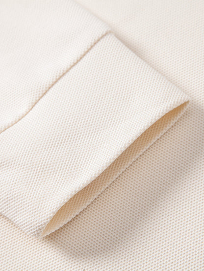 Polo de manga longa com gola contrastante