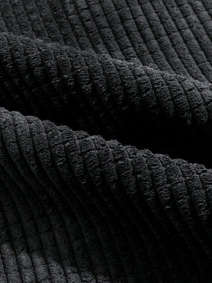 Calça de veludo cotelê com painéis estampados de paisley